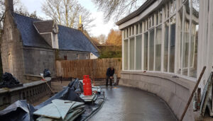 Man fitting flat roof in Aberdeen