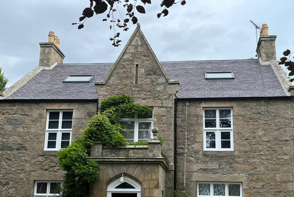newly slated roof on traditional granite house